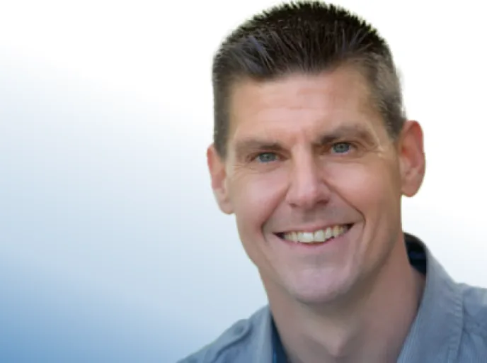 Dr Trevor De Vries