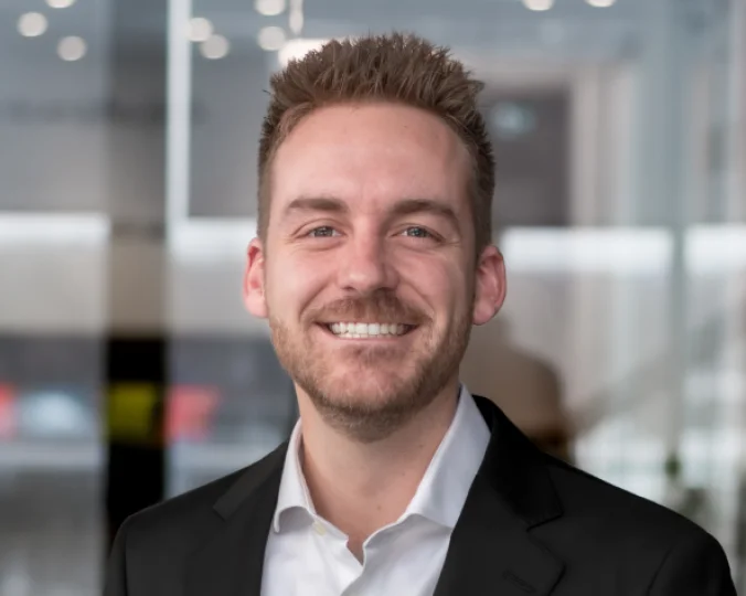 Headshot of Anthony Fontaine with a black suit and a white shirt.